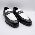 Executive Leather Penny Loafer Two Tone - angled sole studio shot