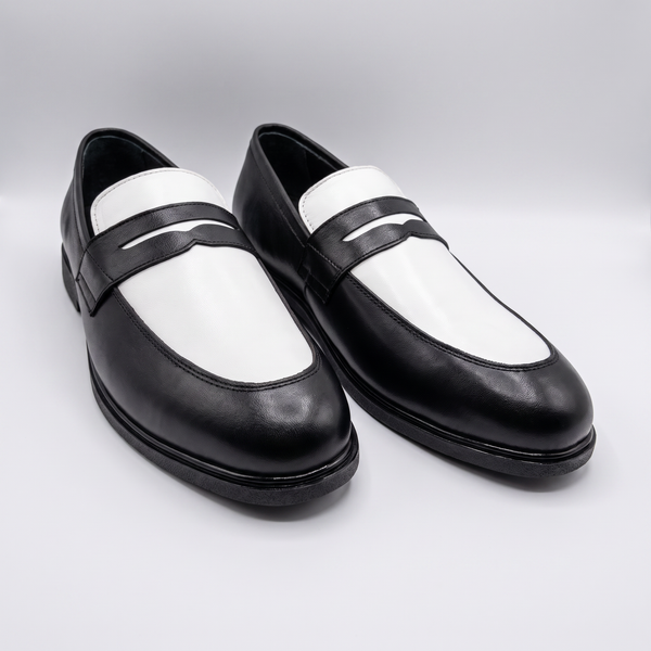 Executive Leather Penny Loafer Two Tone - angled sole studio shot