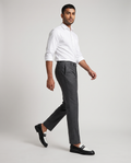 Model wearing Executive Leather Penny Loafer Two Tone - walking