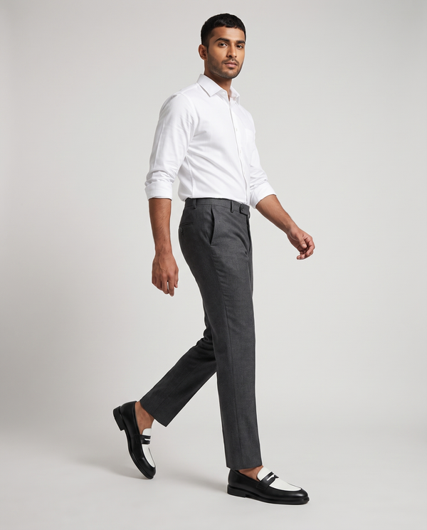 Model wearing Executive Leather Penny Loafer Two Tone - walking