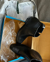 Zorva black leather Chelsea boots delivered in original packaging